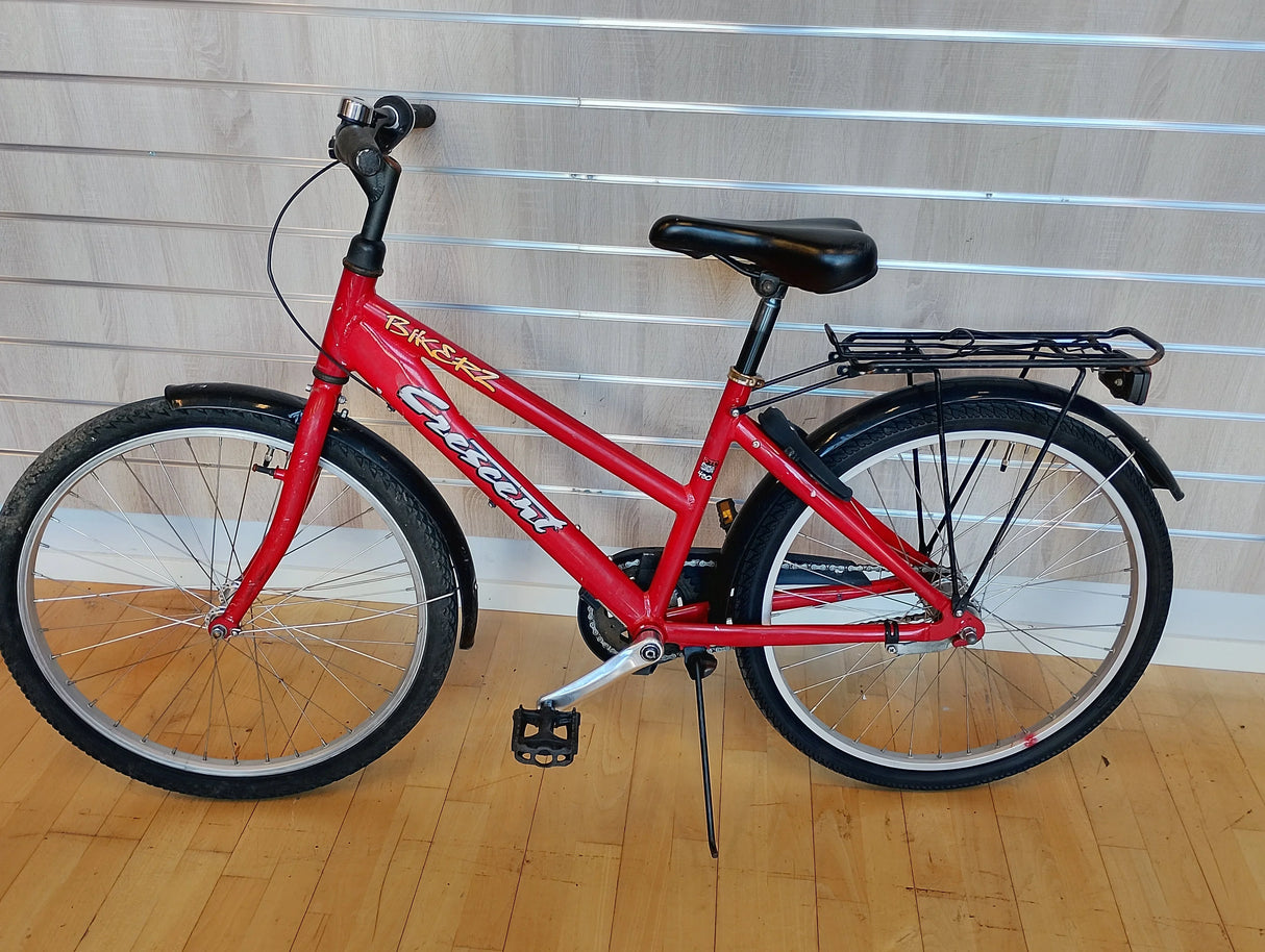 röd Crescent cykel med pakethållare, svart sadel och robust ram