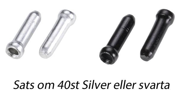 Två silverfärgade och två svarta vajerändhylsor till cykel, text: Sats om 40st Silver eller svarta