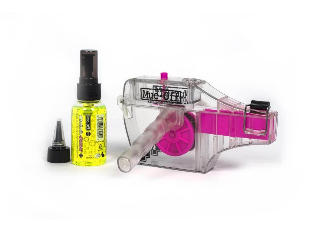 Muc-Off cykelkedjerengörare med klar plast och rosa rullar och gul rengöringsspray