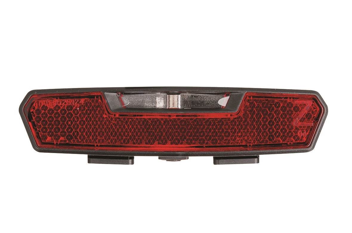 Röd cykelreflex bak med hexagonmönster och svart kant, cykeltillbehör