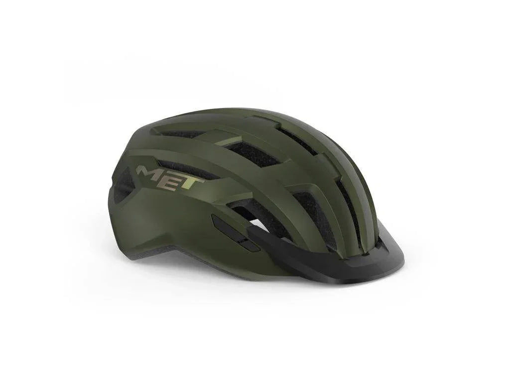 Grön MET cykelhjälm med ventilationshål och svart skärm