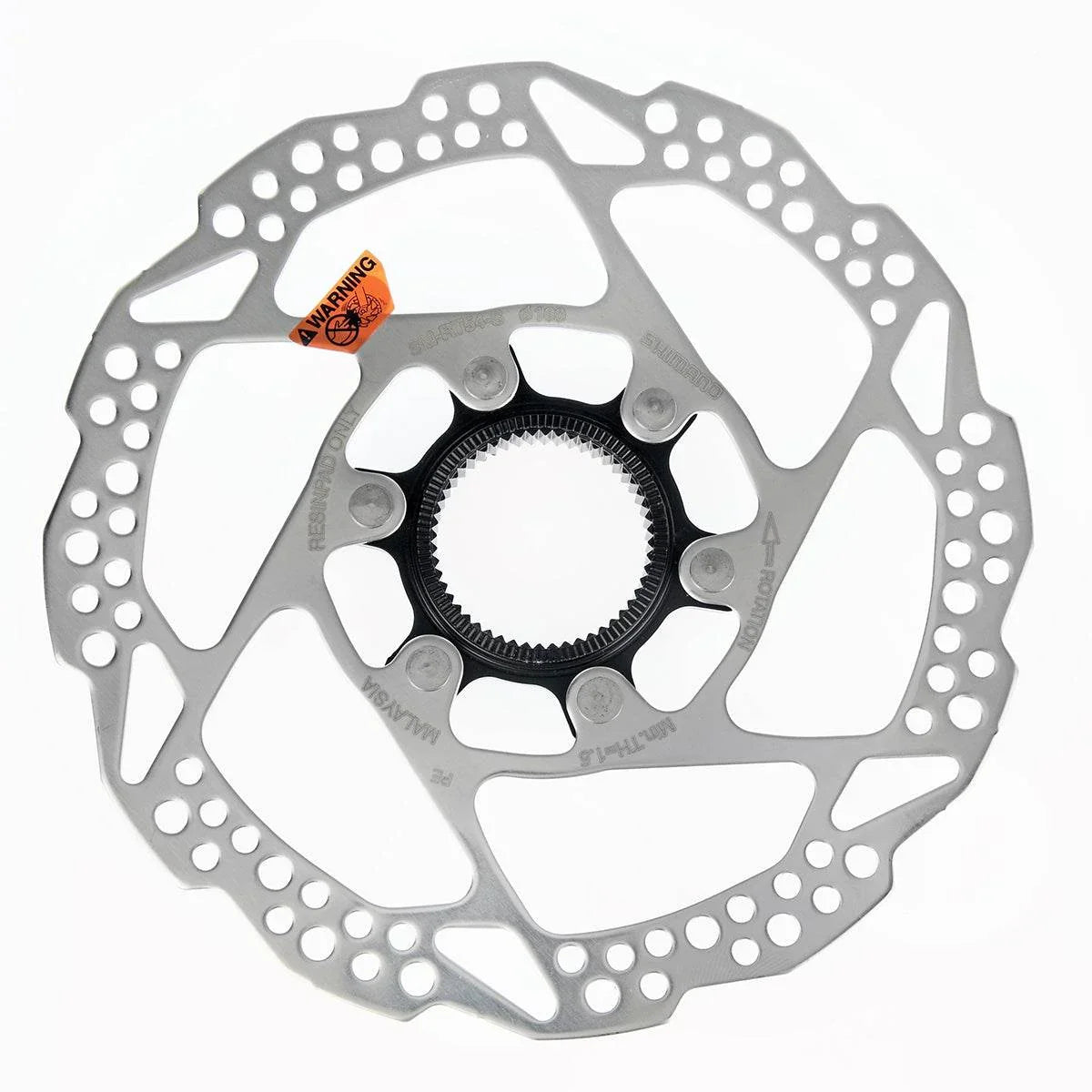 Shimano cykelskiva i rostfritt stål med svart nav och varningsetikett