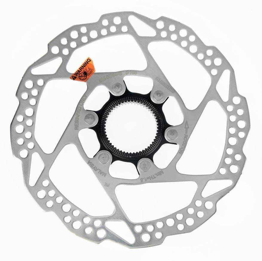 Shimano RT54 bromsskiva med perforerad design och svart centrumfäste för cykeldelar