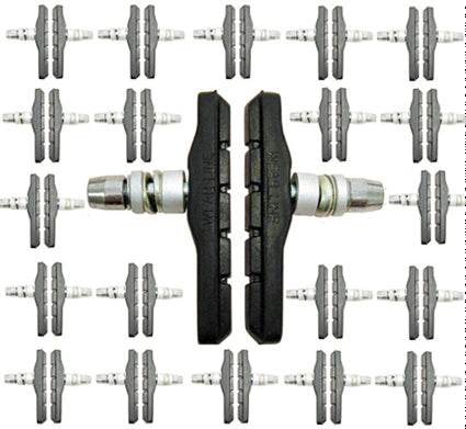 svarta cykel bromsklossar uppställda i rutmönster, närbild